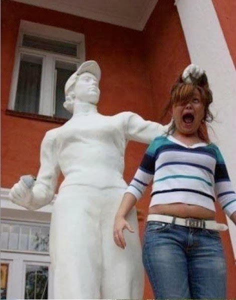 Tourist Posing Inappropriately with Statues  3