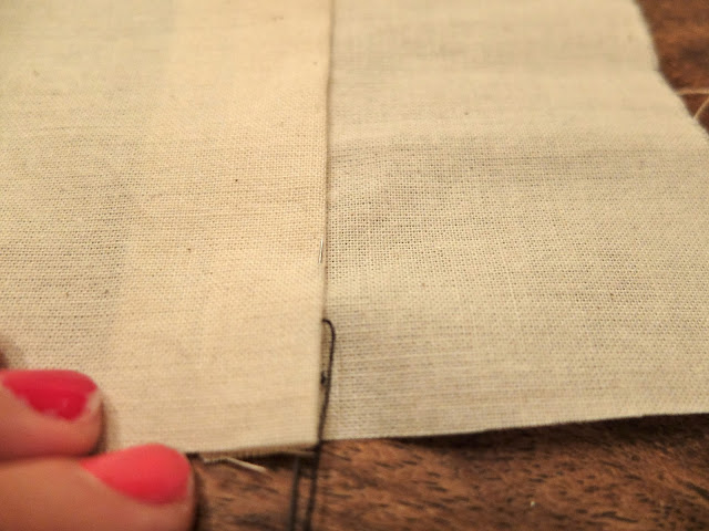 3. Then insert the needle into the bottom layer of the fabric, as close ...