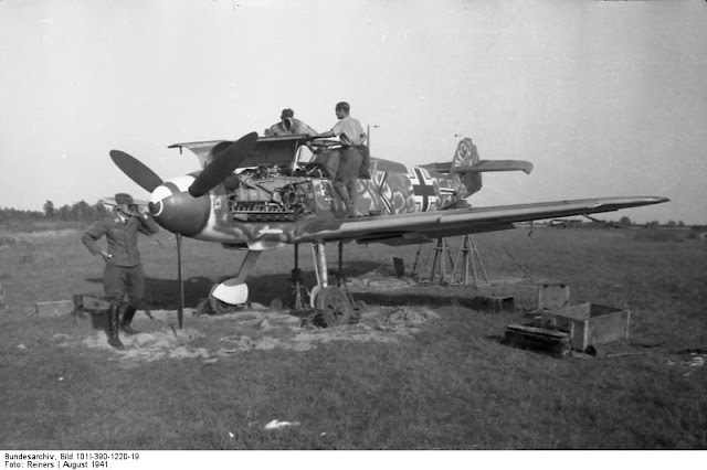 Bf-109E fighter of JG 54 having its guns sighted, 1 August 1941 worldwartwo.filminspector.com