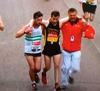 Runner helping struggling runner