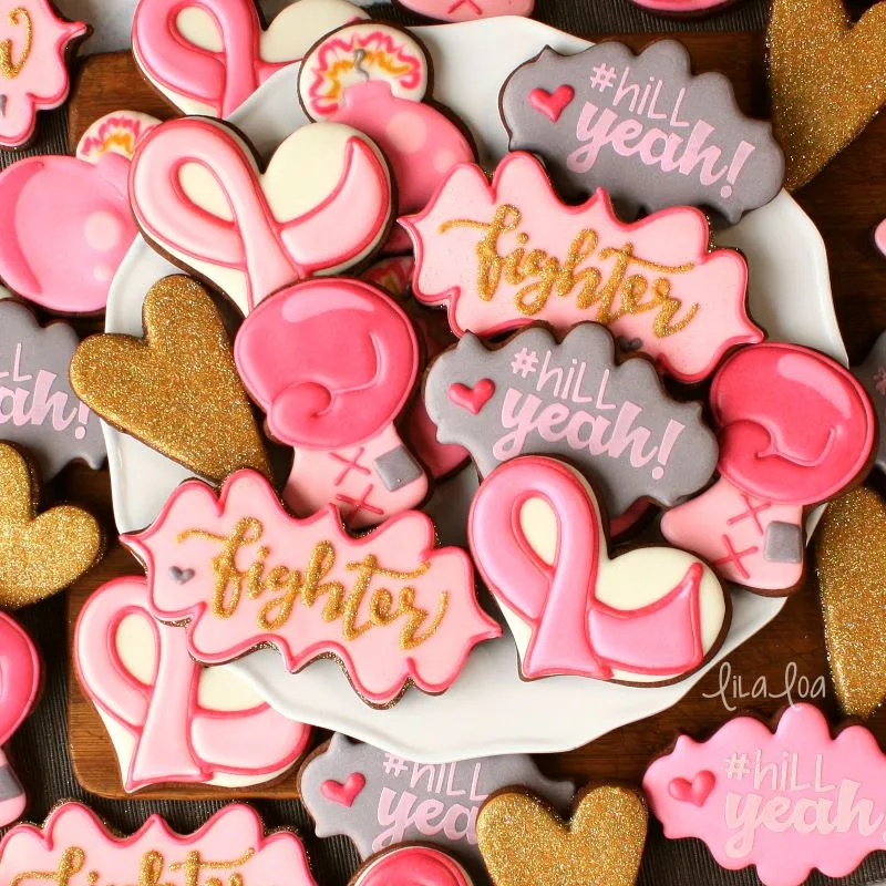Pink and gold breast cancer decorated sugar cookies - ribbons and boxing gloves