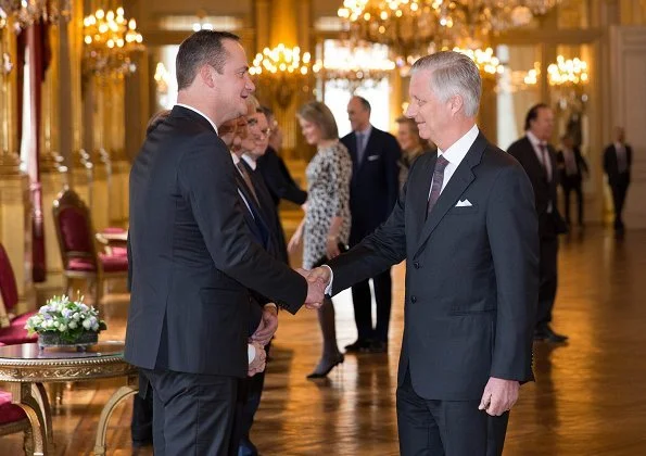 King Philippe, Queen Mathilde, Prince Lorenz and Princess Astrid attend New Year’s Reception. Queen Mathilde wore Natan leopard-print dress