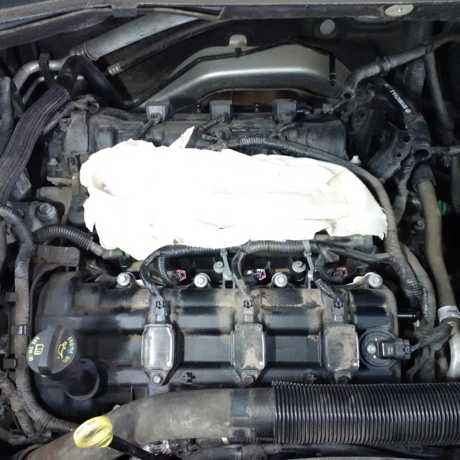 Another Day Another Project: Changing Spark Plugs on my 2011 Dodge