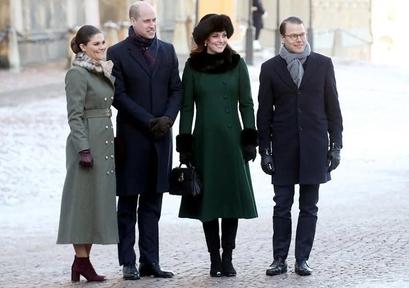 Kate Middleton wore a new bespoke Catherine Walker coat and dress. Duchess accessorised her coat with a faux fur collar and faux fur cuffs from Troy London