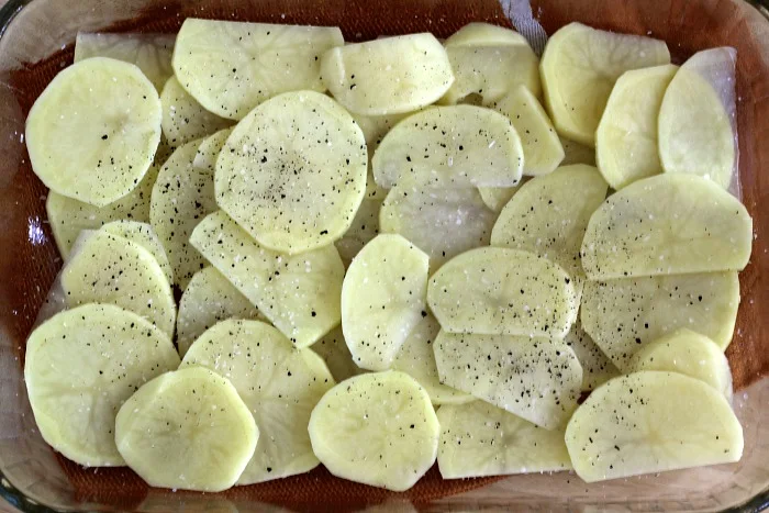 Cheeseburger Casserole Recipe layer of potatoes in pan