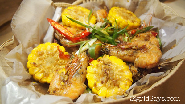 Shrimp in a basket with corn