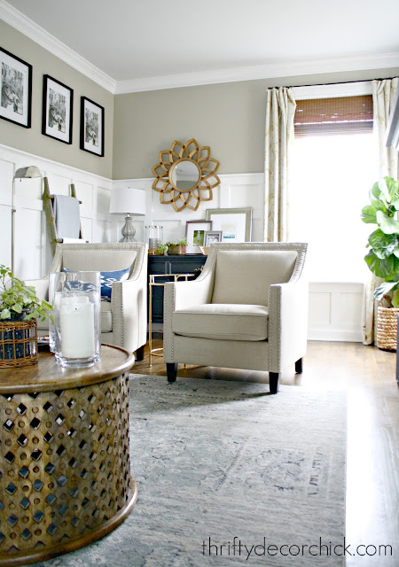 Neutral arm chairs family room