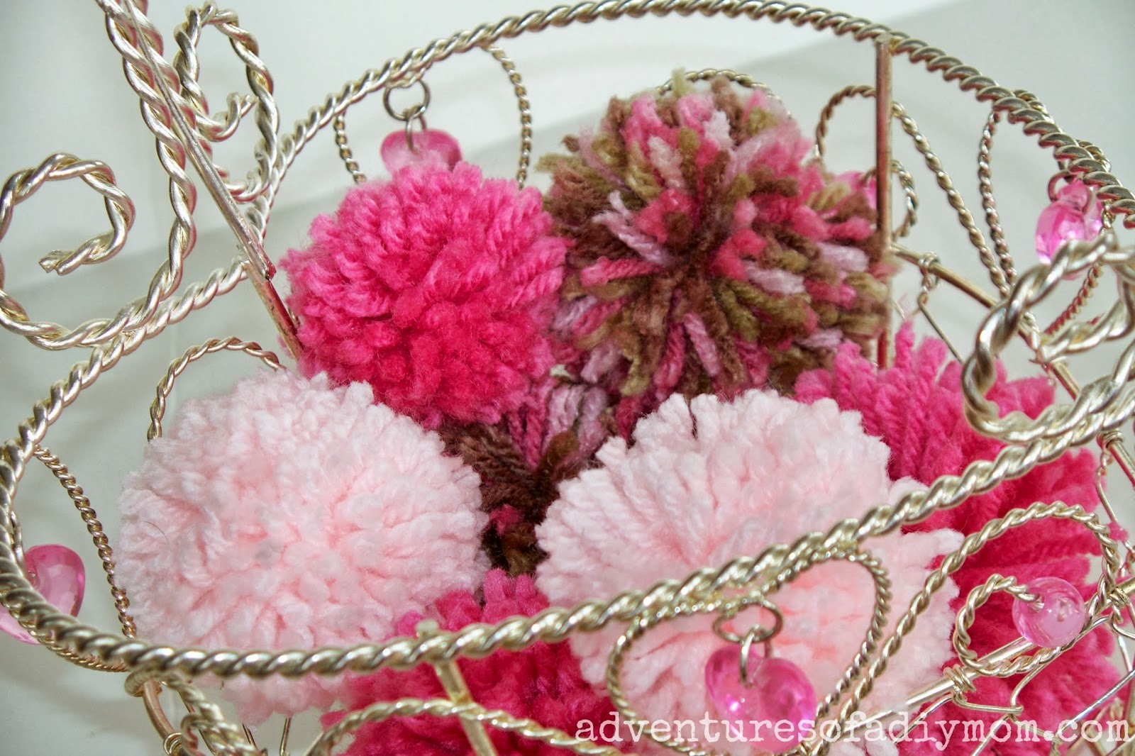 How to Make Yarn Pom Poms Adventures of a DIY Mom