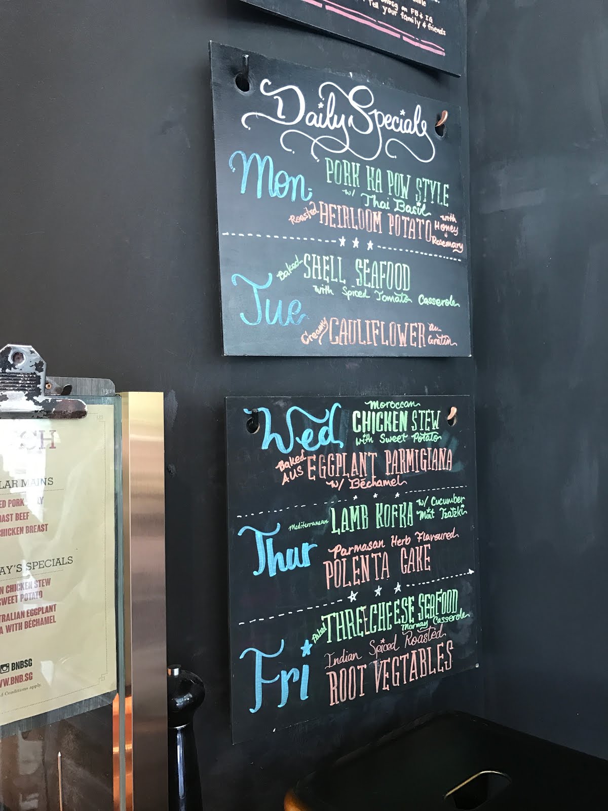 bottles & bones, raffles place. noms.