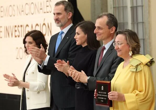 Queen Letizia wore Cos draped-neck ribbed wool dress. The Queen handed out the awards to the awardees of National Research Awards
