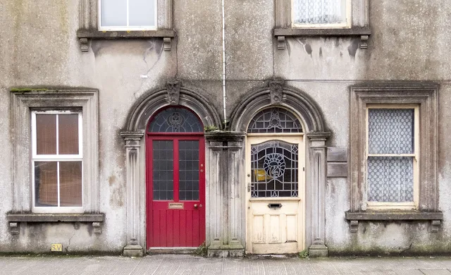 Red and white doors in Youghal, County Cork spotted on an Irish road trip between Dublin and Kinsale