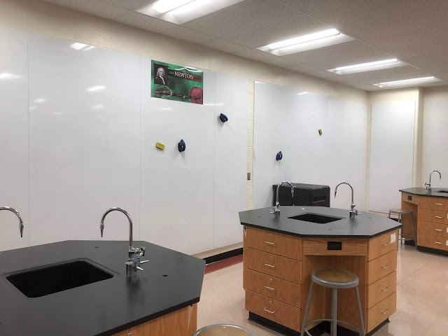 Science classrooms outfitted with dry-erase boards on the walls.