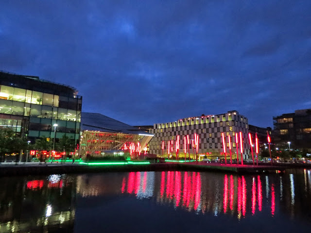 Grand Canal Dock at night viewing from a Dublin canal cruise