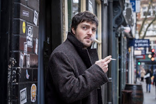 Strike Tom Burke smoking