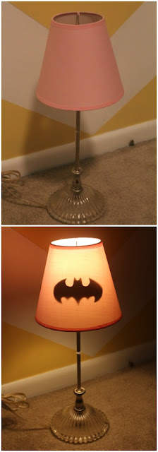 Step by Step to Glue Batman´s Magic Symbol on a Bedside Lamp.