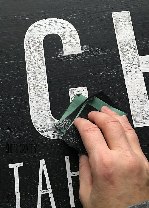 Use vinyl as a stencil for wooden signs