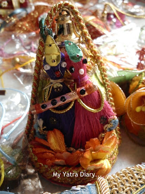 Lord Krishna coconut decorative given as gift to sisters in law during Raksha Bandhan
