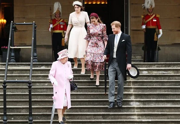 Princess Eugenie wore Sandro wrap dress. Princess Beatrice wore The Vampire's Wife floral-print silk dress. Duke of Sussex