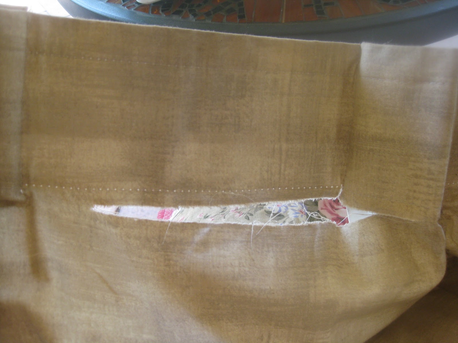 Fixing tears in a curtain!