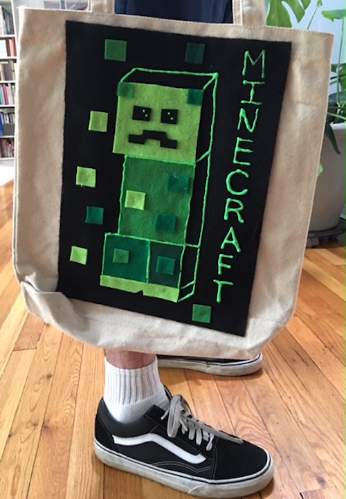 DIY Minecraft party bags using cheap black paper sacks and printed