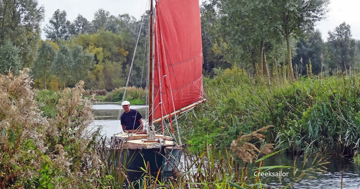 sailing boat on canal creeksailor yacht sailing on canals sailing boat on canal creeksailor yacht sailing on canals