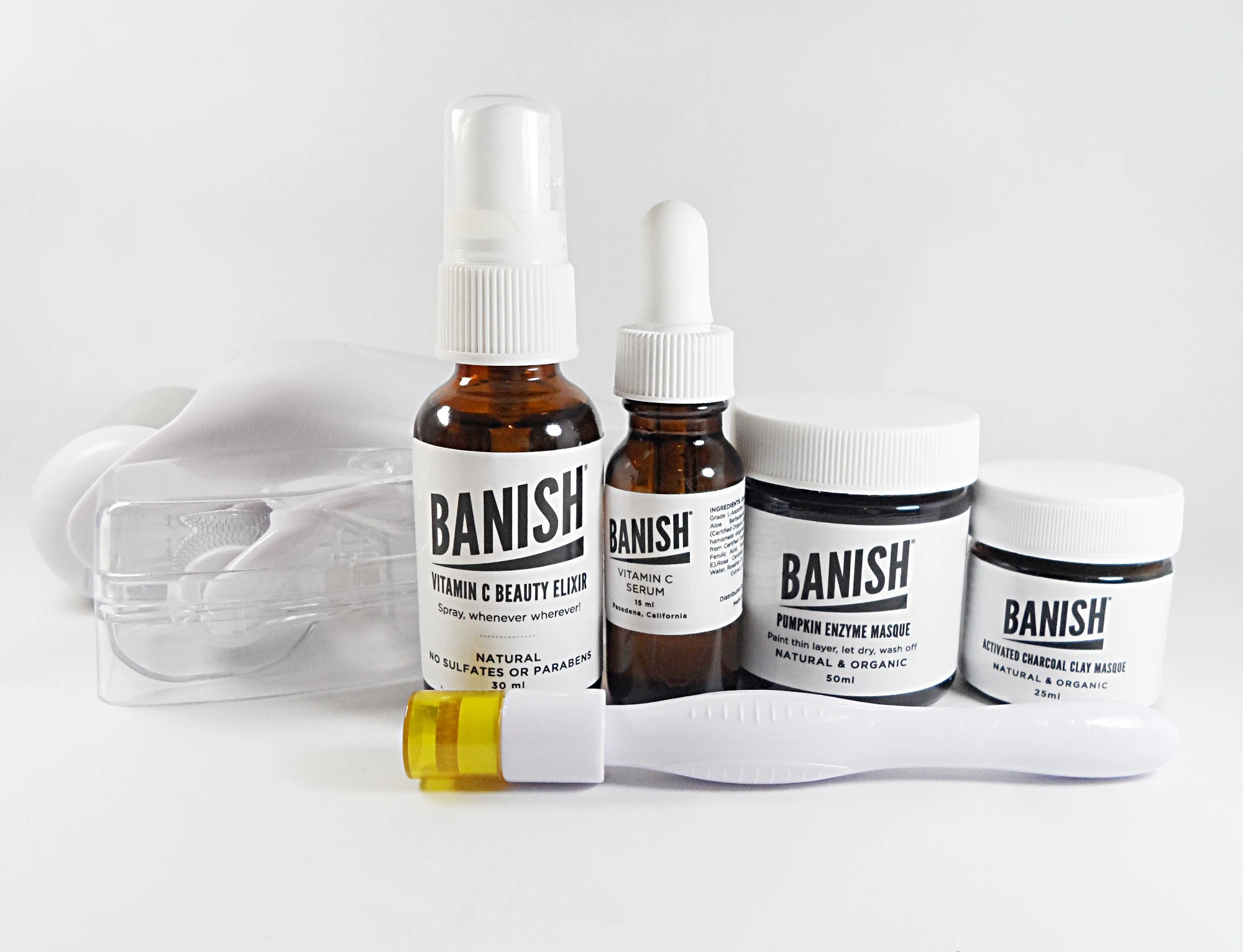 various skincare products by brand Banish on a white studio background