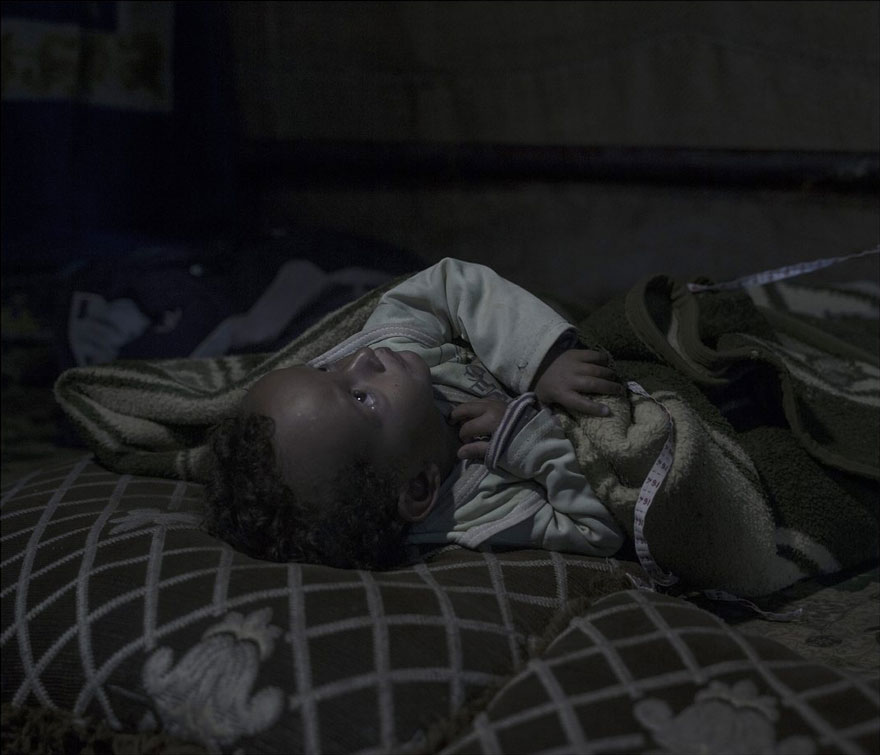 Photographer Reveals The Heartbreaking Places Syrian Refugee Children Sleep - Amir, 20 months, Zahle Fayda