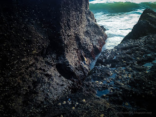 The Waves Of Sea Water Flow Between The Rocks At Batu Bolong Beach, Canggu Village, Badung, Bali, Indonesia
