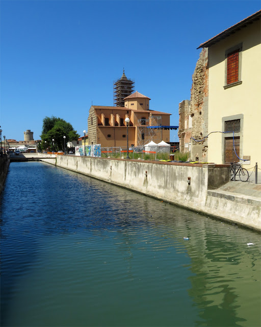 The scaffolded bell tower of San Ferdinando, seen from the new canal, Livorno