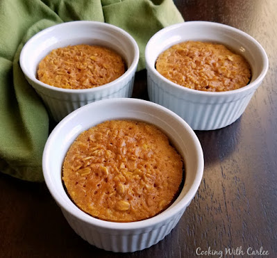 This baked oatmeal tastes like fall and has a texture more like a baked pudding than the baked oatmeal you are used to. You have to try it to believe it! 3 white ramekins of single serve baked oats