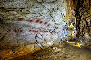 Red Disks - from El Castillo cave, disks dated at least 40,800 years, found 2012