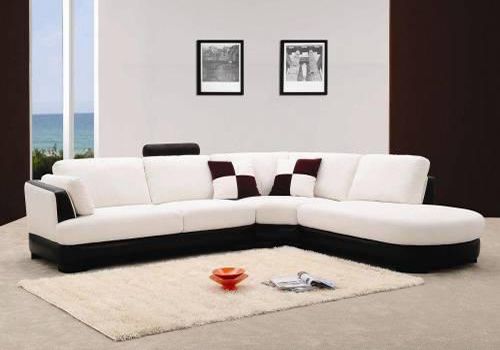 Sự kết hợp tinh tế giữa hai màu trắng-đen của sofa chữ L phòng khách
