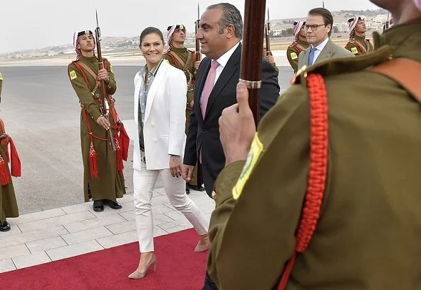 Crown Princess Victoria and Prince Daniel with Lena Hallengren are making a 3 day visit to Jordan. Amman Citadel. H&M Blazer suit