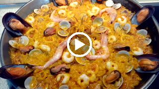 Arroz paella almejas, mejillones, calamares gambas malaga