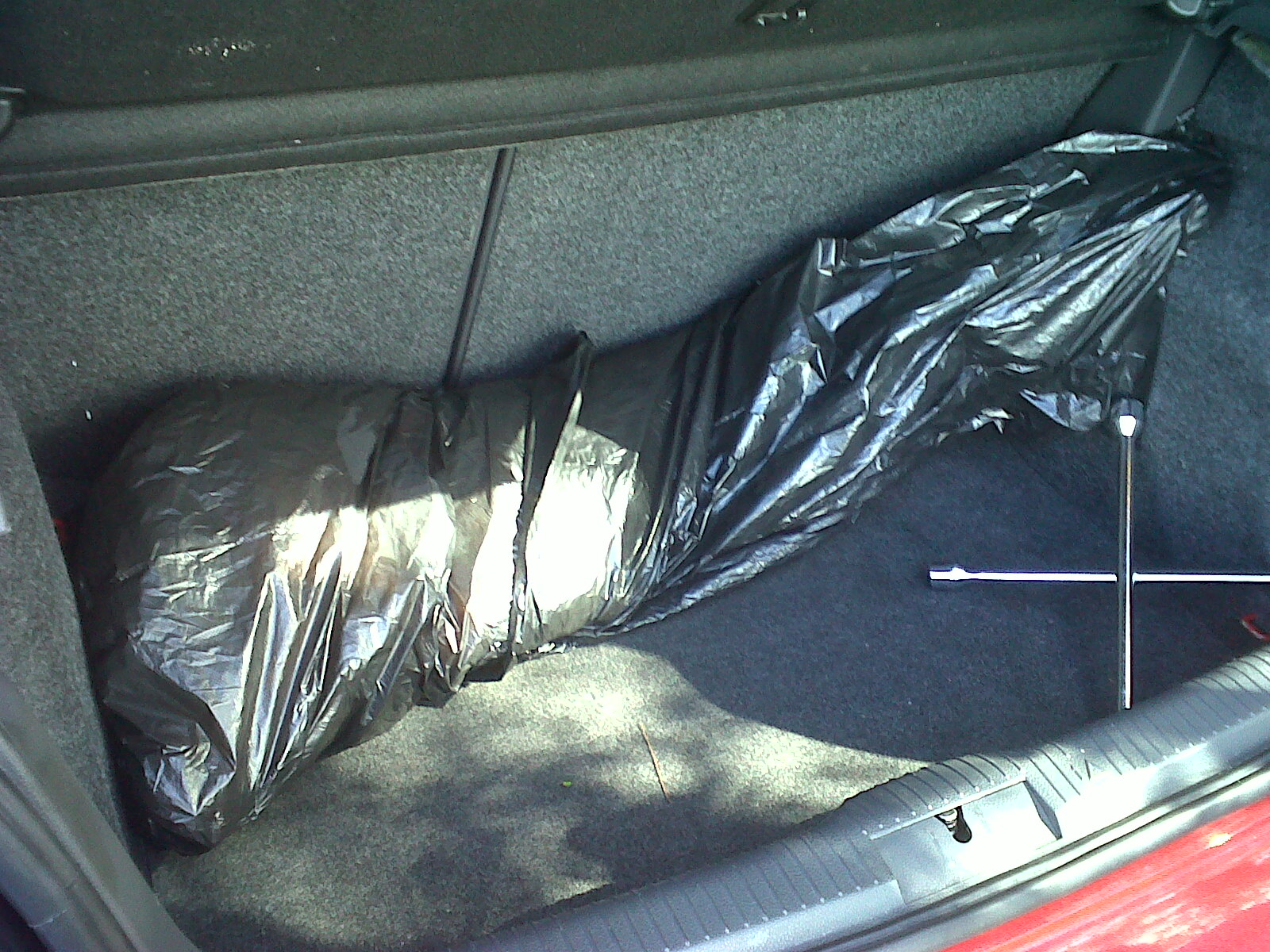 Innocently Oblivious Body bag in the trunk of my car