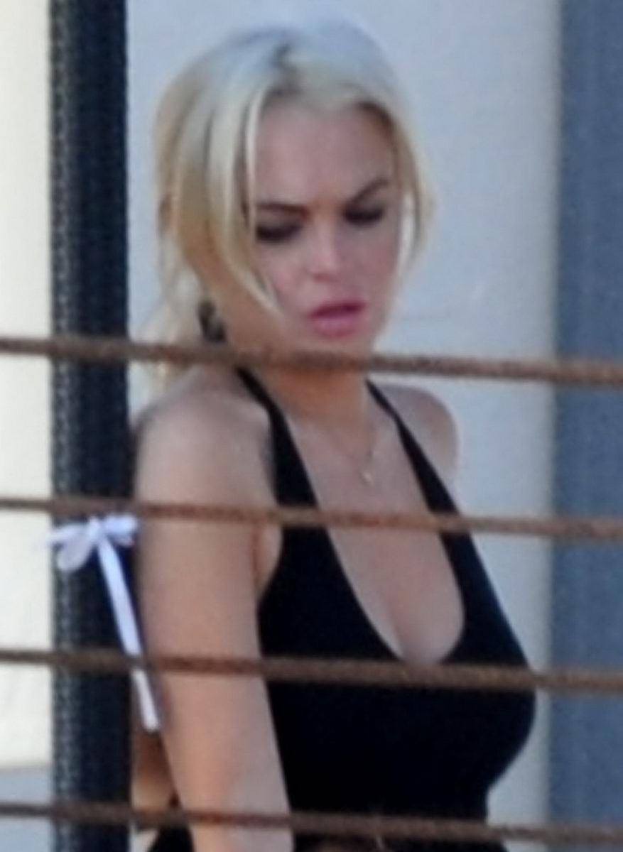 Lindsay Lohan Showing Cleavage Candids While Partying On Rooftop Latest Celebrity Fashion