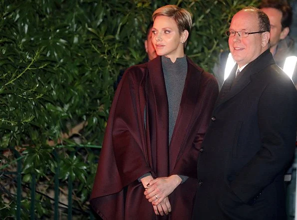 Princess Charlene and Prince Albert attend the traditional 2017 Sainte Devote procession in Monaco. Wore Akris cape