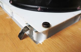 Plastic plate mounting to vent