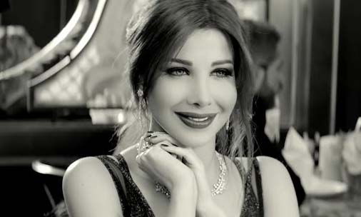 كلمات اغنية حاسة بيك - نانسي عجرم كلمات اغنية حاسة بيك - نانسي عجرم