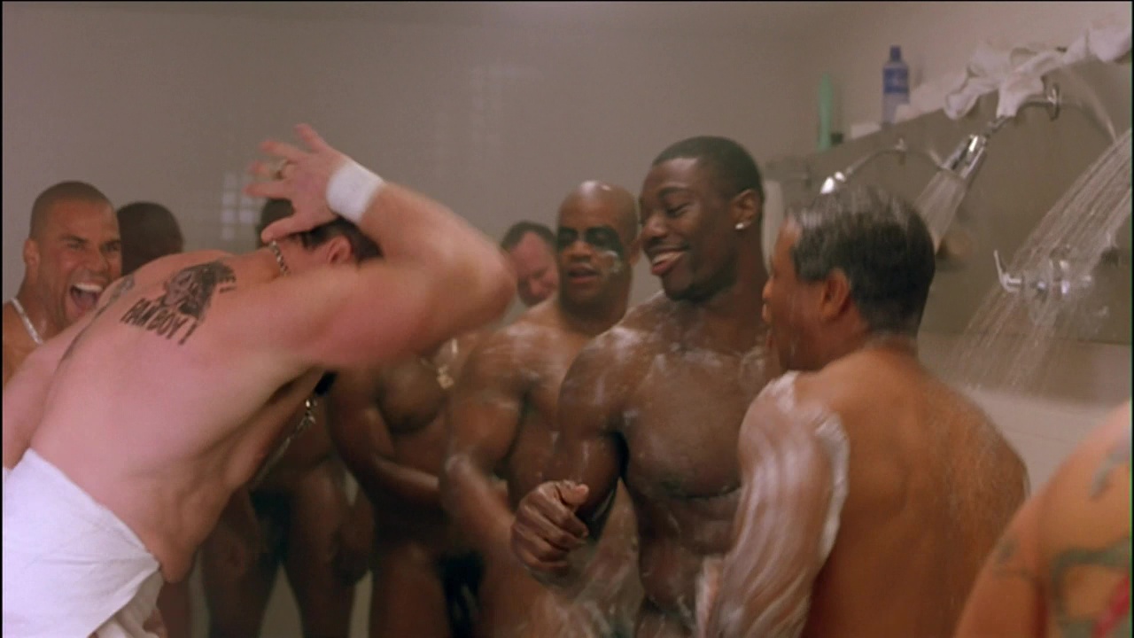 John Clark and extras nude in Any Given Sunday.