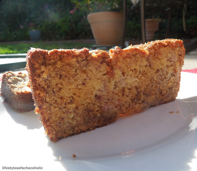 close up of a slice of banana bread on a white plate 