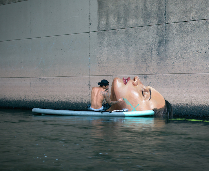 Artist Paints Murals of Women While Floating on a Surfboard Artist Paints Murals of Women While Floating on a Surfboard