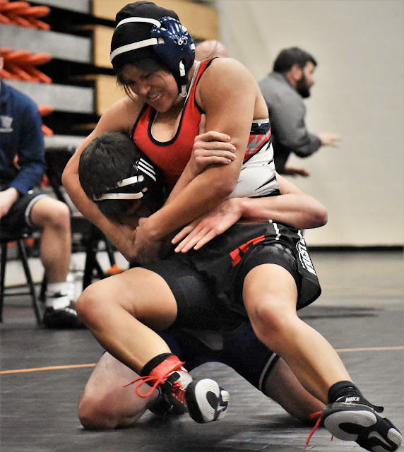 Men Wrestling Women she's got him