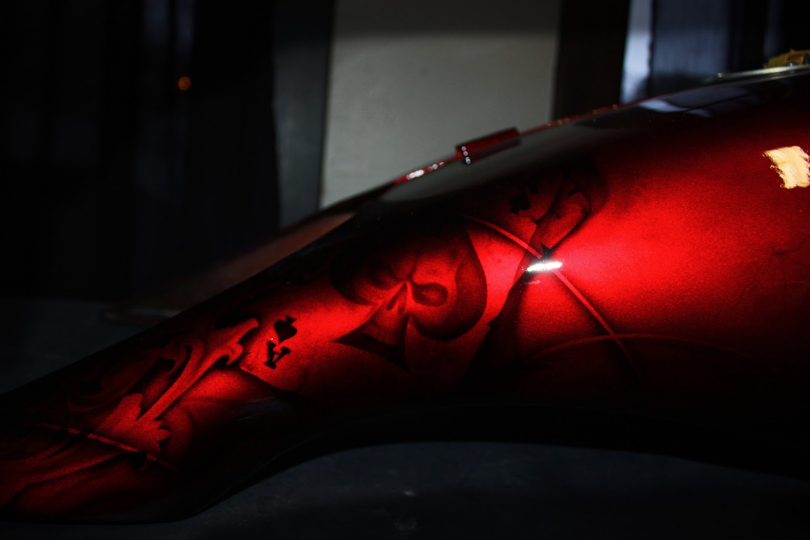Online Motorcycle Paint Shop Candy apple red with gambling skulls and