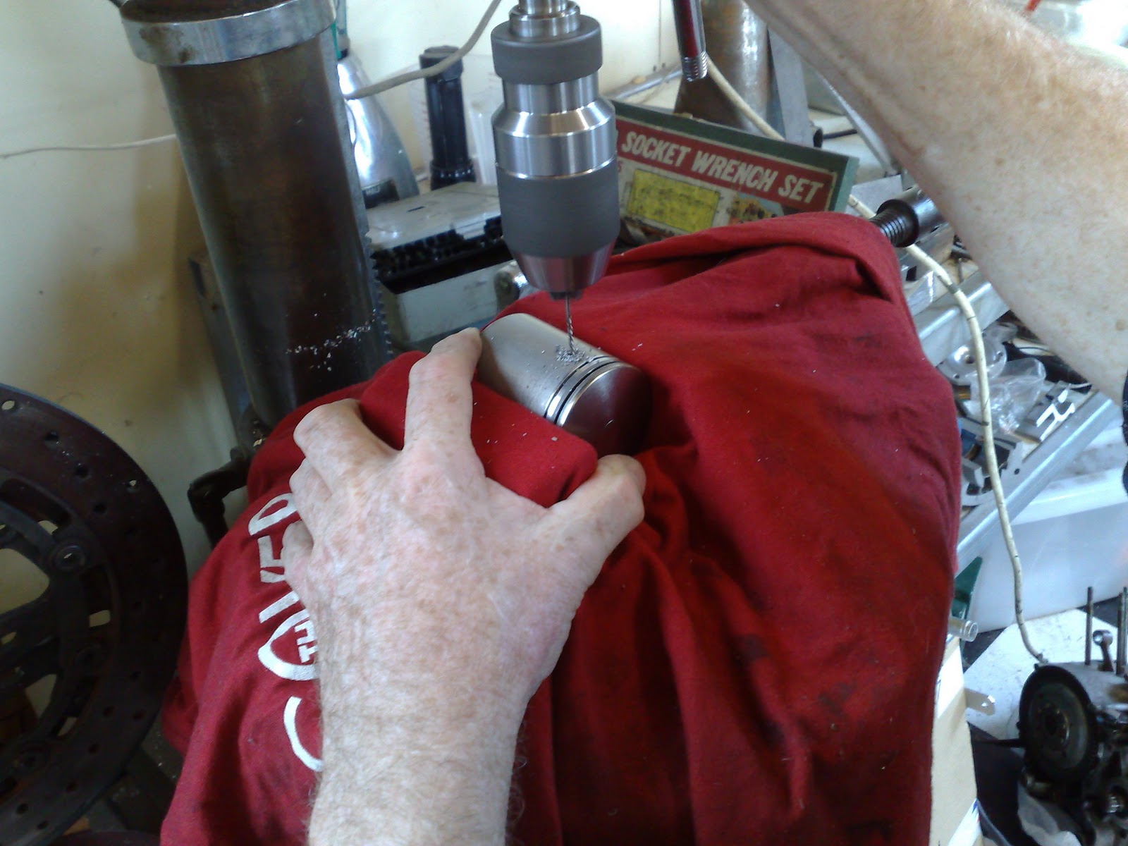 NSR250 Forum Holes in pistons for exhaust port bridge