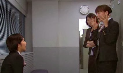 Misaki, Wakamura and Sekiyama talk in the locker room.