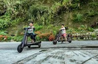 Local Ifugao wooden scooter kids