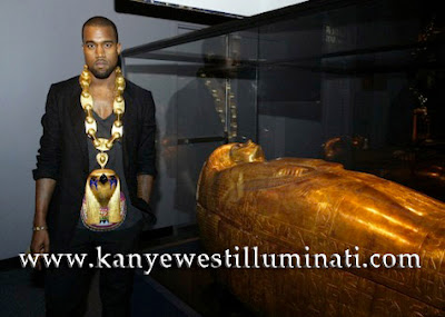 is kanye west in the illuminati posing with horus chain and egyptian sarcophogus