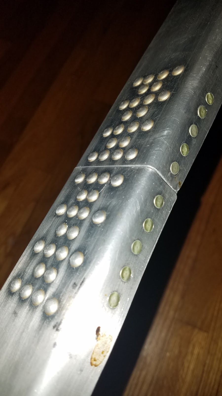 Solid rivets joining two pieces of
