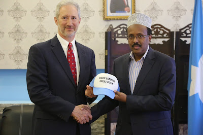 1 See what the US Ambassador to Somalia gave to the new Somali President that's causing an uproar on social media